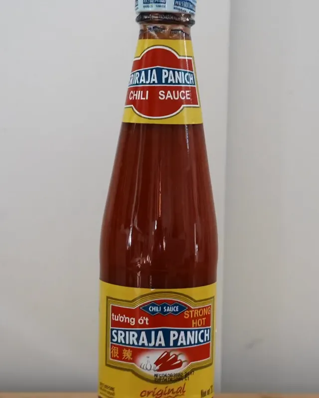 Sriraja Panich Strong Hot sriracha in a glass bottle