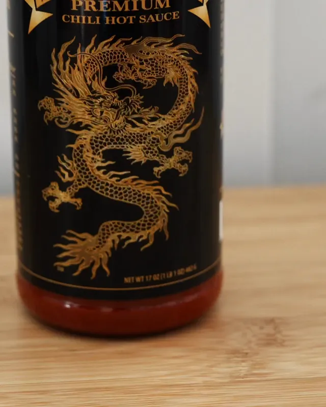 Underwood Ranches Premium Chili Hot Sauce bottle with a gold dragon label